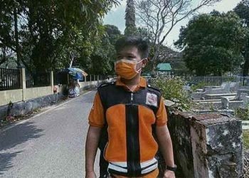 Rizvan Nanda Irianto (19), relawan petugas pemulasaraan jenazah termuda di Kota Malang. Foto : Dok Pribadi.