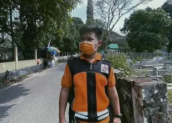 Ini Dia Petugas Pulasara Jenazah Covid-19 Termuda di Malang - Ini Dia Petugas Pulasara Jenazah Covid-19 Termuda di Malang
