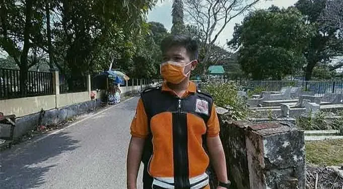 Ini Dia Petugas Pulasara Jenazah Covid-19 Termuda di Malang - Ini Dia Petugas Pulasara Jenazah Covid-19 Termuda di Malang