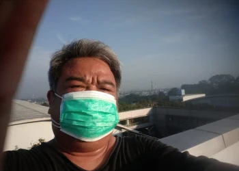 Erwin Kustiman saat menjalani Isoman Covid-19