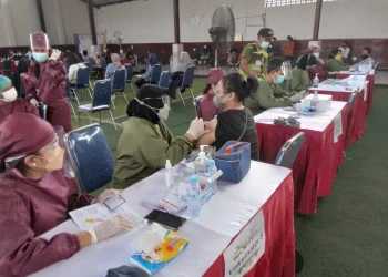 STIE - Dukung Percepatan Herd Immunity, STIE Malangkucecwara dan Kodim 0833 Kota Malang Gelar Vaksinasi COVID-19