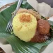 Nasi kuning disajikan dengan Masak Habang, di rumah makan Soto Banjar Belitung, Kalpataru, Malang/tugu malang