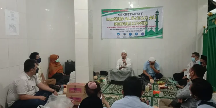 Ketua Takmi Masjid menyampaikan penjelasan Masjid Al Fattah jadi Masjid Peduli COvid-19