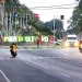 Suasana jalan Idjen Kota Malang di sore hari tampak sejuk dan ramai kendaraan/tugu malang