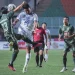 Pemain Arema FC saat bertanding dengan PSS Sleman