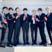 7 Member BTS menunjukkan paspor diplomatik yang diberikan oleh Presiden Korea Selatan, Moon Jae In pada Selasa (14/9/2021)/tugu malang