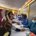 Vaksinasi ikut sambil kompetisi pakaian adat