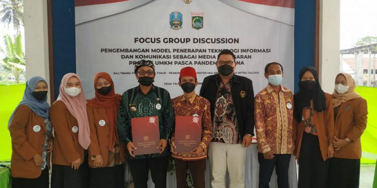Penandatanganan Memorandum of Agreement (MoA) antara Prodi PPKn dengan Pemerintah Desa Talok, Kabupaten Malang. Foto: dok