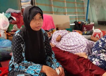 Sri Wahyuni (47), warga Kampung Putih yang juga korban banjir bandang di Malang. Foto: Aisyah