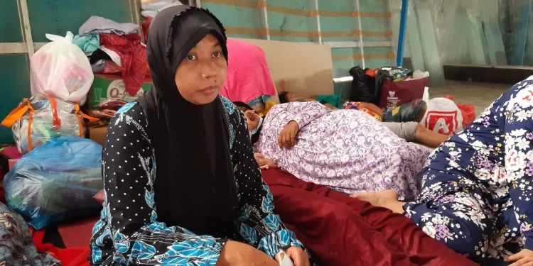 Sri Wahyuni (47), warga Kampung Putih yang juga korban banjir bandang di Malang. Foto: Aisyah