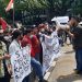 Aksi demo PMKRI Cabang Malang di depan Balai Kota Malang, pada Jumat (10/12/2021). Foto: Aisyah Nawangsari