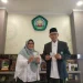 Unisma terima penghargaan.