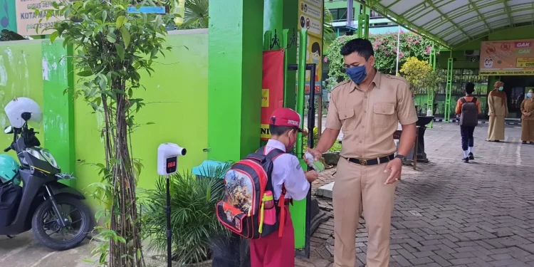 Ilustrasi protokol kesehatan di salah satu SD di Kota Malang. Foto: dok