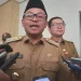 Wali Kota Malang Sutiaji (tengah) dan Kadinkes Kota Malang dr Husnul Muarif (kanan).