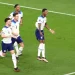 Marcus Rashford saat berselebrasi bersama rekan setimnya usai mencetak gol ke gawang Timnas Wales.