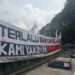 Keranda dan foto korban Tragedi Kanjuruhan yang ditata melingkari Alun Alun Tugu Kota Malang