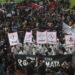 Ribuan Aremania menggelar aksi long march sambil membawa ratusan keranda, pada Kamis (10/11/2022).