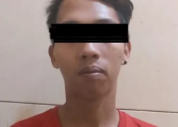 Tersangka pengedar pil koplo, LH (26) setelah diamankan polisi.