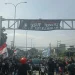 Aremania melakukan aksi menuntut keadilan bagi korban Tragedi Kanjuruhan