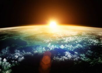 Ilustrasi matahari yang menyinari bumi.