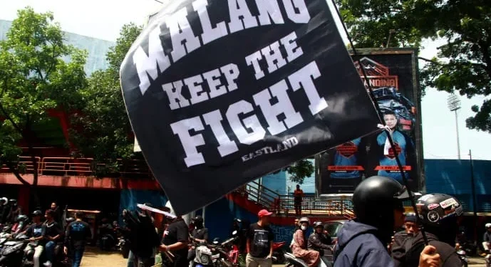 Aremania Turun ke Jalan. foto/Rubianto