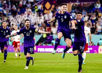 Julian Alvarez saat merayakan golnya ke gawang Polandia di Stadium 974.
