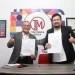 CEO Tugu Media Group, Irham Thoriq, dan Branch Manager BTN Malang, Surasta, saat tandatangan kerja sama.