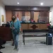 Dian Patria saat meninggalkan ruang sidang.