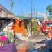 Kilatan api yang menyambar hingga atap rumah akibat pom mini terbakar diduga akibat korsleting pada mesin, Rabu (19/4/2023).