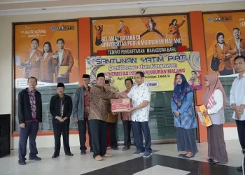 Kegiatan penyaluran santunan pada panti asuhan di Malang.
