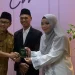 Wali Kota Malang, Sutiaji bersama kedua pasang mempelai yang baru saja sah menjadi suami-istri.