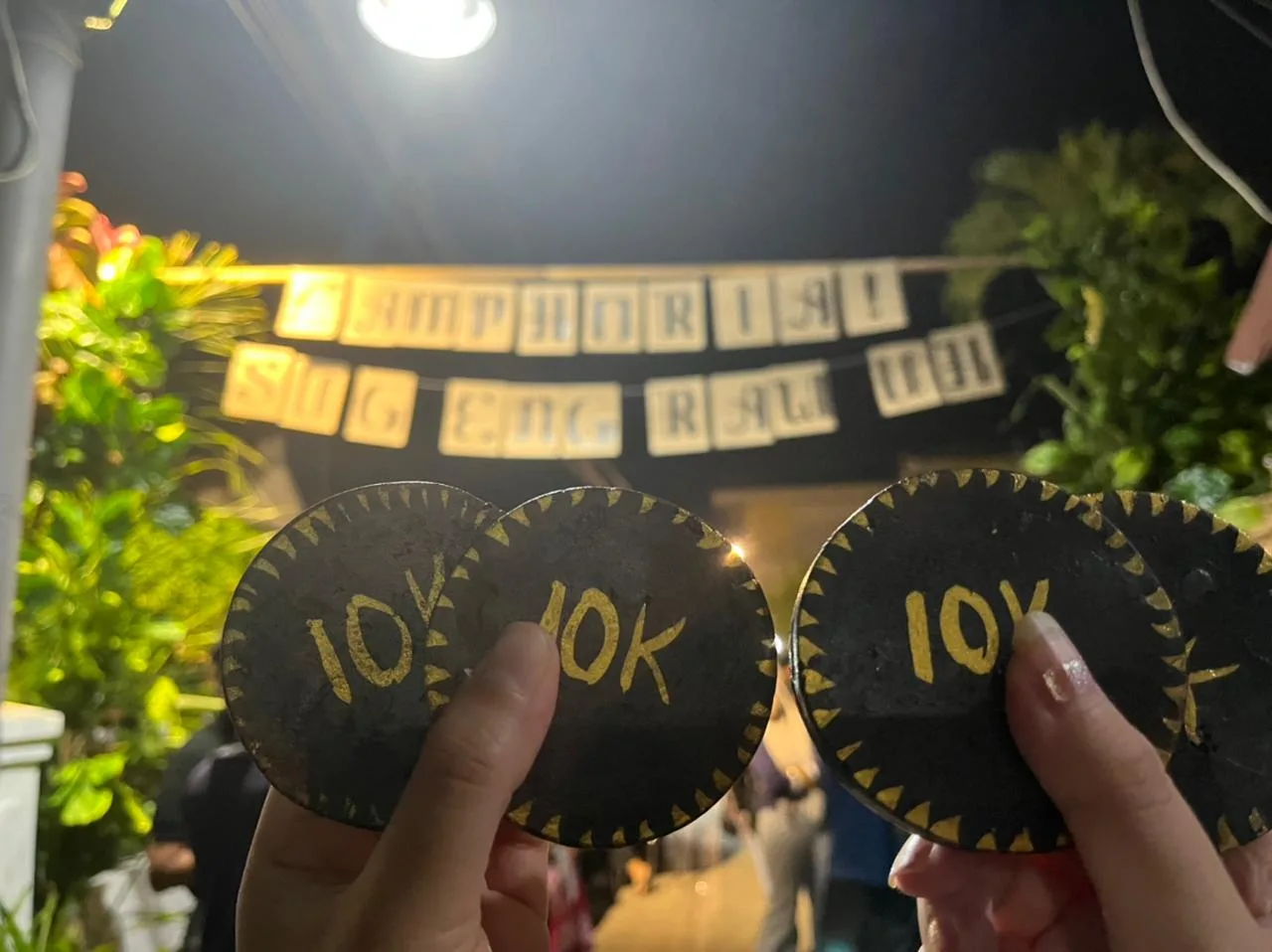 Koin kreweng sebagai alat transaksi di mini bazaar CAMPHORIA.
