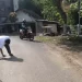 tambal jalan berlubang