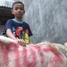 Muiz, bersama kambing yang dia beli berkat hasil tabungannya selama sekira 4 tahun sejak kelas 1 SD.
