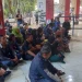 Keluarga korban Tragedi Kanjuruha menggelar doa bersama di depan Gate 13 Stadion Kanjuruhan.