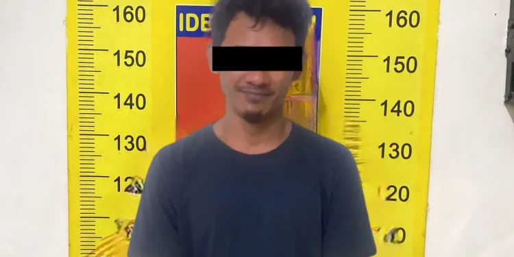 Tersangka HBS (37) usai diamankan petugas.