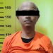 Tersangka IR usai diamankan di Polsek Kepanjen.