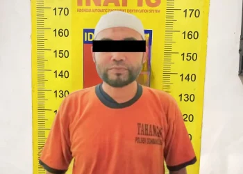 Tersangka UF usai diamankan pihak kepolisian.