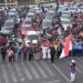 Potret pengendara jalan di Kota Malang memperingati detik detik proklamasi.