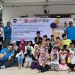 Para pengajar dari Universitas Brawijaya saat memberikan edukasi literasi keuangan terhadap anak-anak pekerja migran di Malaysia.