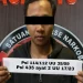 Tersangka AK setelah diamankan oleh Satresnarkoba Polres Malang.