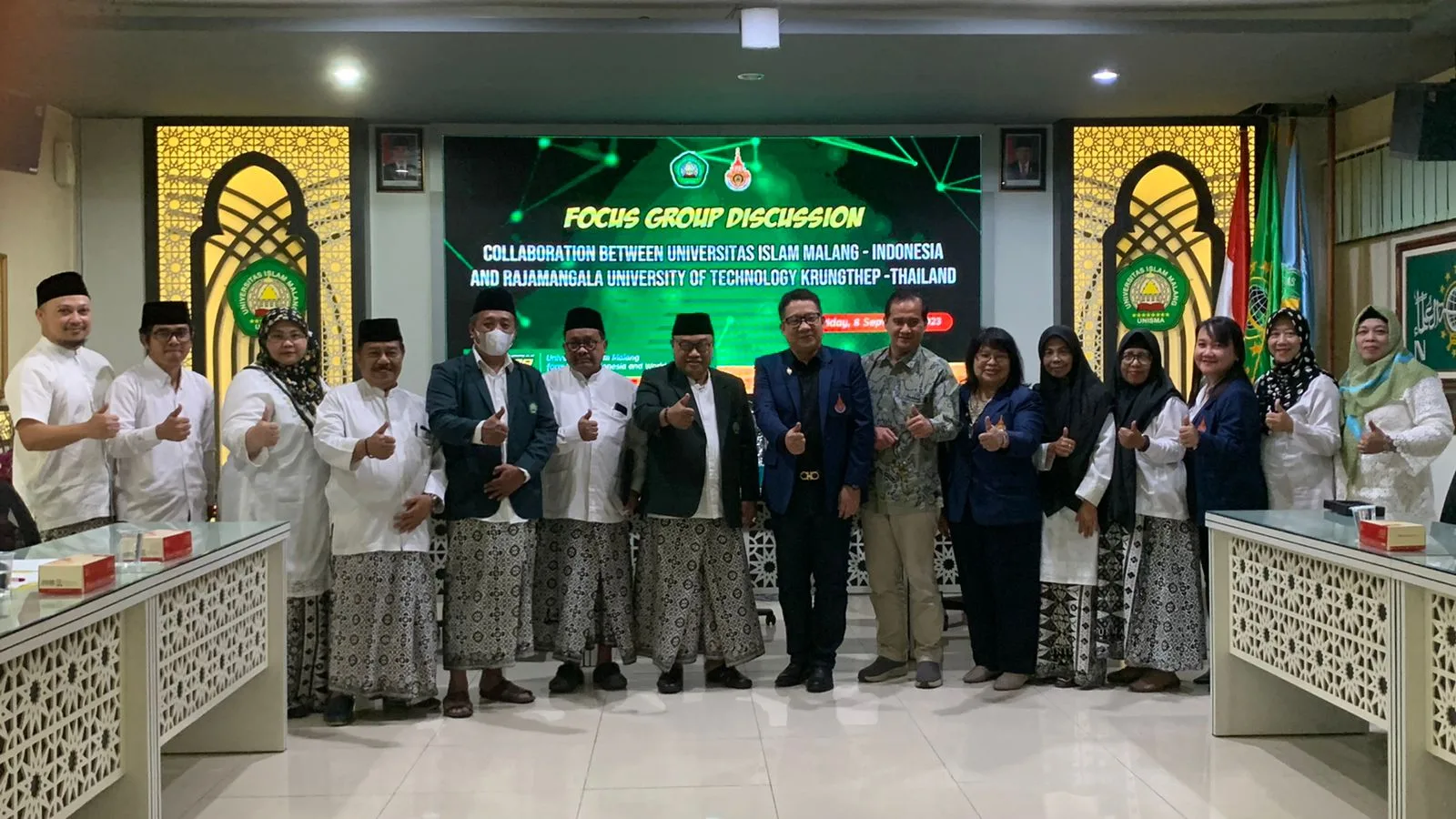 Foto bersama jajaran antar perguruan tinggi. 