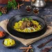 Nasi mandhi kambing, salah satu makanan khas Timur Tengah.