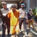 Tersangka Imam Suaidi digelandang di Polres Malang.