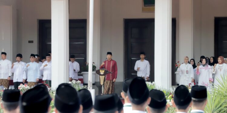 Pj. Wali Kota Malang, Dr. Ir. Wahyu Hidayat, M.M, saat memberikan sambutan.