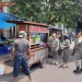 Petugas menindak pedagang PKL di Kota Malang yang berjualan di bahu jalan dan trotoar.