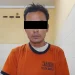 Tersangka AR yang berhasil ditangkap polisi karena mengedarkan pil koplo.