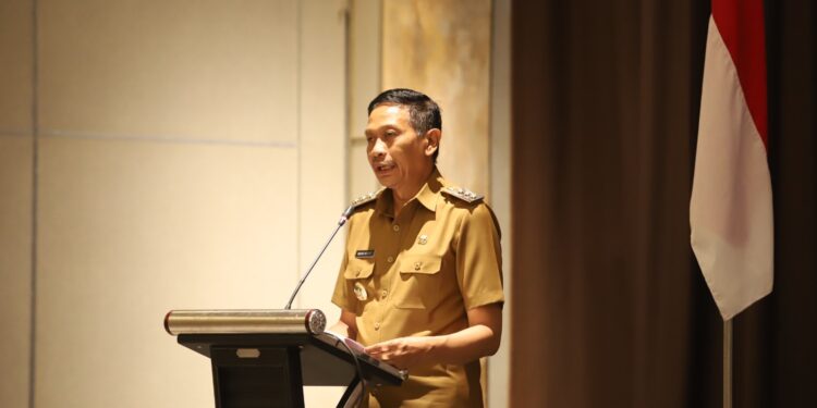Pj Wali Kota Malang, Dr. Ir. Wahyu Hidayat, M.M, saat memberikan pemaparan.