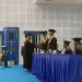 Pengukuhan salah satu guru besar oleh Direktur Polinema Supriatna Adhisuwignjo.