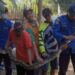 Petugas Damkar Kabupaten Malang berhasil mengevakuasi ular piton di Kecamatan Pakis.
